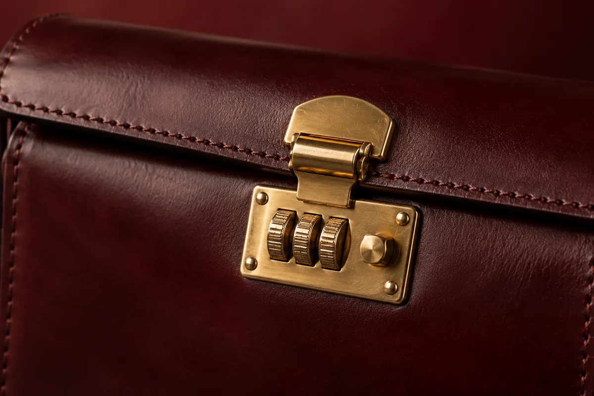 Brass combination latch on a leather document case